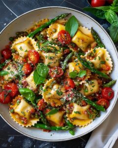 Sun-Kissed Ravioli with Tomato, Asparagus, and Herbs Recipe