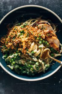 Garlic Cream Bucatini with Peas and Asparagus Recipe