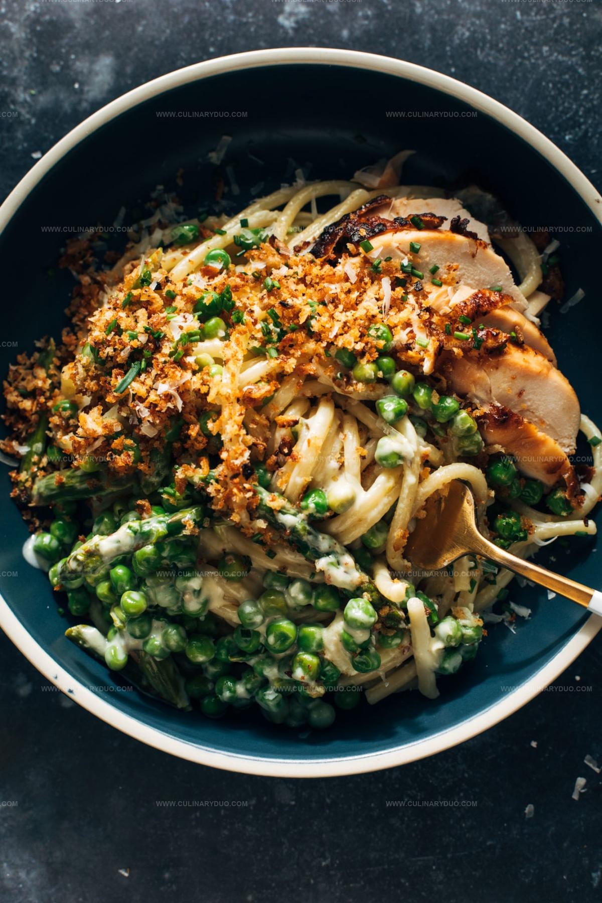 Garlic Cream Bucatini with Peas and Asparagus Recipe