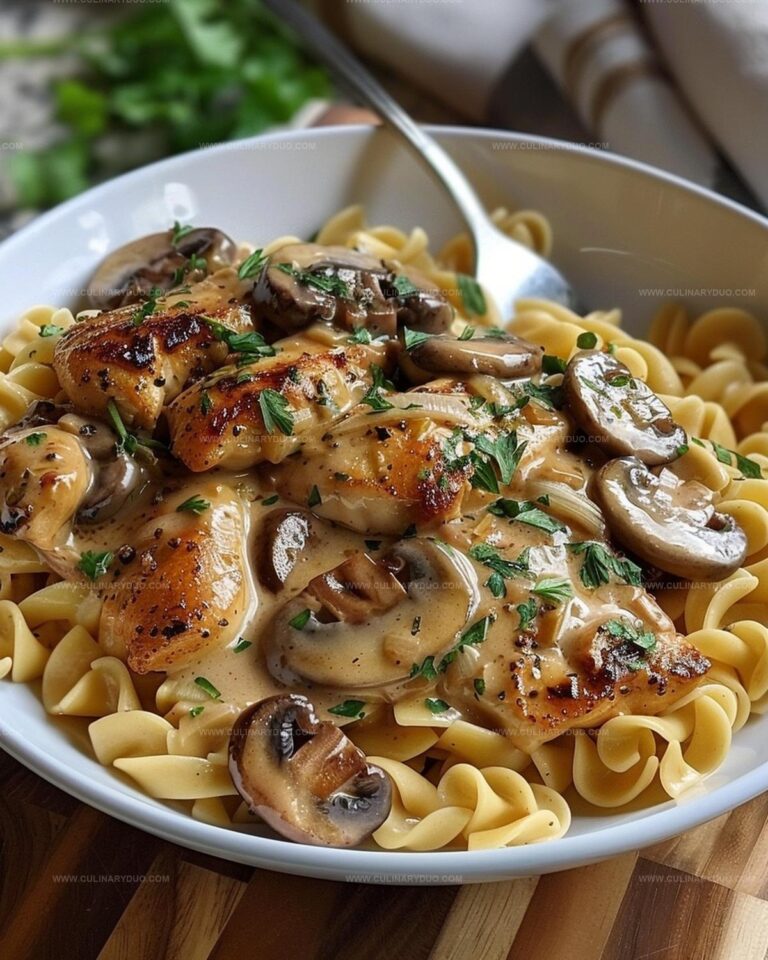 Tender Chicken Medallions in a Rich Mushroom Sauce over Buttered Noodles Recipe