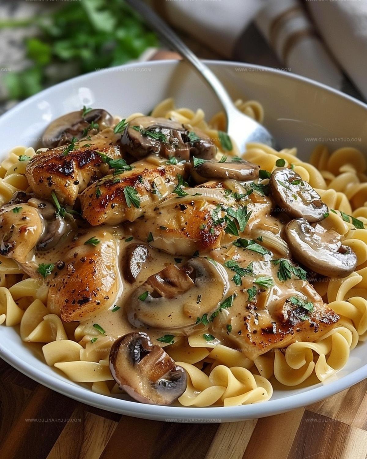 Tender Chicken Medallions in a Rich Mushroom Sauce over Buttered Noodles Recipe